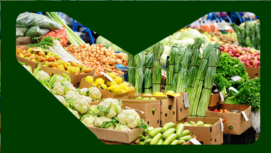 imagem de uma banca de feira com verduras e legumes