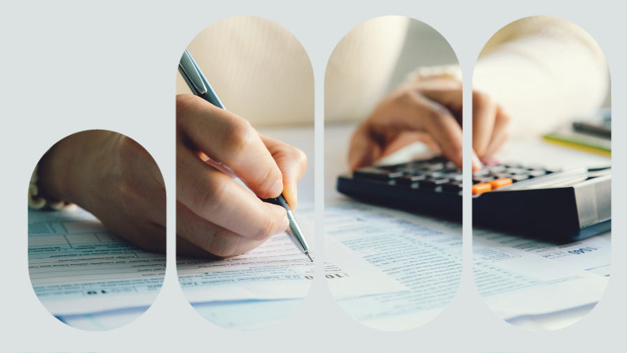 mão de uma pessoa fazendo contas e digitando calculadora