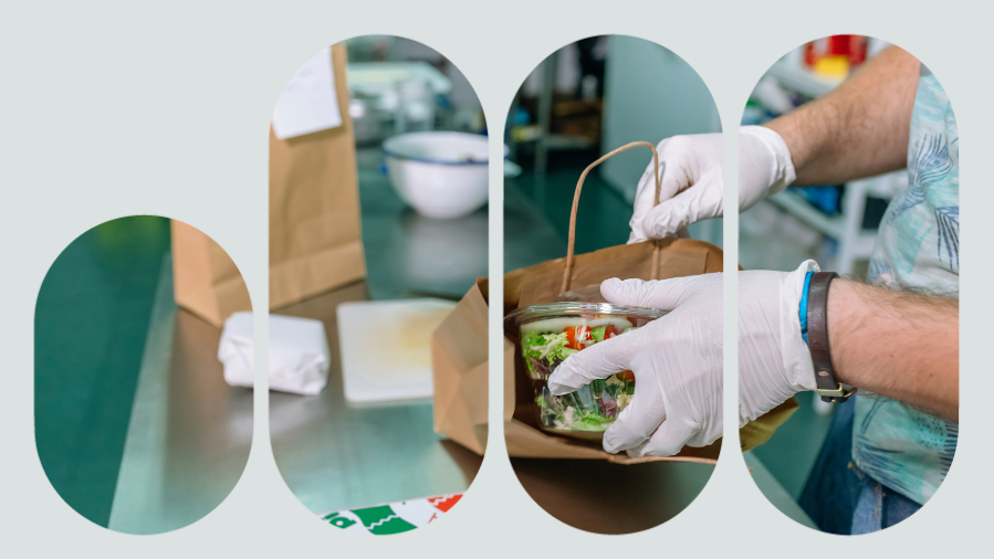 mão com luvas colocando salada de delivery na embalagem para entrega